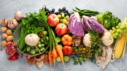 Local farmers food assortment on light background.
