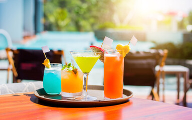 Mixed fruit juices to welcome tourists in a relaxing vacation concept resort.