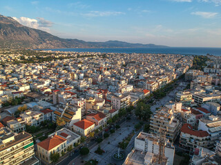 Fototapeta na wymiar Beautiful panorama view over the center of Kalamata city, Greece. Aerial photography over Messenia, Greece, Europe