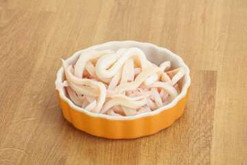 Marinated squid strips in the bowl