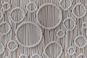 Beautiful boho macrame on wall panel. tapestry in the style of Boho made of cotton threads in...