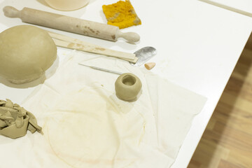 Pottery workshop, clay on table in art studio