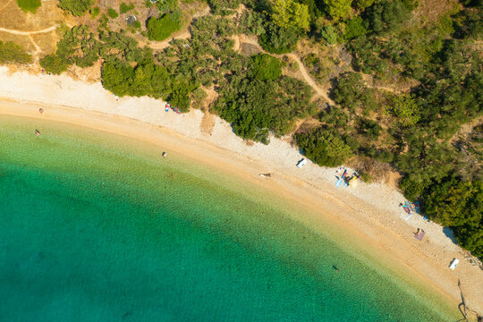 Aerial view of pebble Duba beach in Makarska riviera, the Adriatic Sea, Croatia