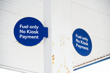Fuel only no kiosk payment sign at petrol station