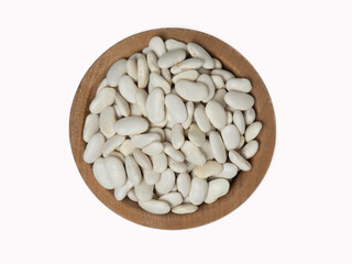Raw white beans in wooden bowl on isolated white background