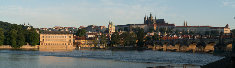 Prague day panorama and reflection in the river