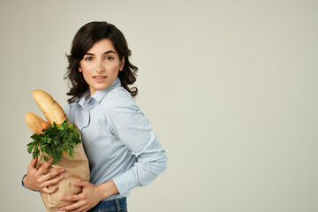 woman blue shirts package groceries shopping supermarket