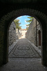 Obraz premium A narrow street of San Lorenzello, a medieval town of Benevento province, Italy.