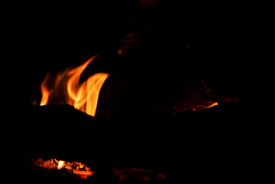 burning coals on fire