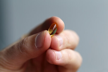 Closeup of vitamin D capsules. Vitamin D is important for your immunity, bones and more. People in...