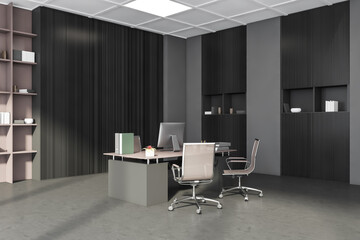 Corner view of grey and beige workspace with office cabinets