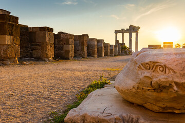 Panoramic view of ruins of ancient Temple of Apollo in Side on sunset, Alanya province, Turkey....