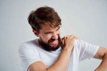 bearded man pain in the neck health problems massage therapy isolated background
