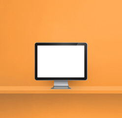 Computer pc on orange shelf background