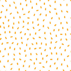 White seamless pattern with yellow sprinkles background.