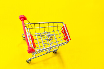 shopping carts used in supermarkets shopping malls yellow background