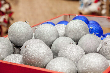 Christmas toy on the Christmas tree. New Year decoration. Decorated shop window