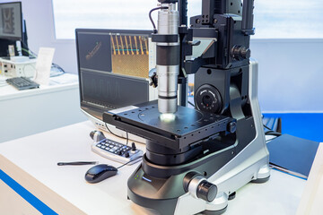 Equipment chemical experiments. Apparatus for working with reagents. Automatic apparatus in laboratory. Device for auto mixing of reagents. Empty glass test tube. Selective focusing. Chemical study