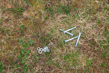 Image of the nuts and bolts on the ground