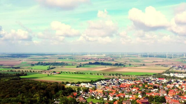Lowland near Salzgitter, Germany, with the suburb Lichtenberg, fields, meadows and wind turbines in the background, aerial view