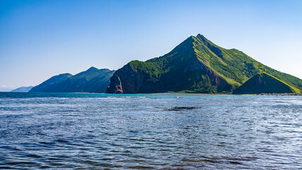 Bold Peak in the Quiet Bay. Sakhalin, Russia. Sea of Okhotsk, Pacific Ocean