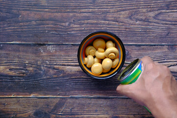 canned Lychee in bowl on table 