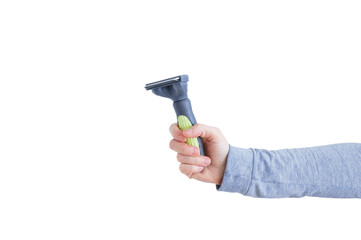 Furminator for combing pet hair in the hand of Caucasian woman. White isolate.