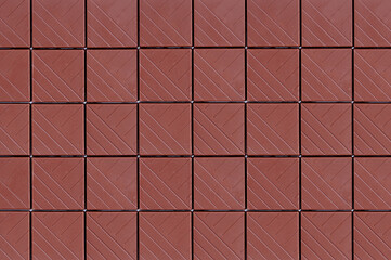 Background of pieces of milk chocolate. Chocolate square bars.