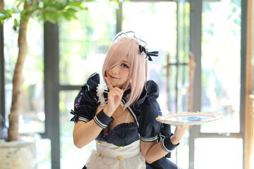 portrait of girl with japanese maid costume in vintage restaurant