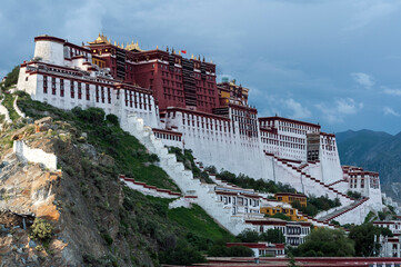 Fototapeta premium LHASA, TIBET - AUGUST 17, 2018: Magnificent Potala Palace in Lhasa, home of the Dalai Lama before the Chinese invasion and Unesco World Heritage Site. 