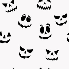 Jack faces wallpaper. White background and funny or scary pumpkin faces.