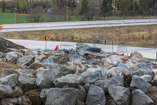 Close up view of construction imploding works on rocky terrain. Sweden. 