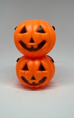 Many Halloween Pumpkins in a row isolated on white background