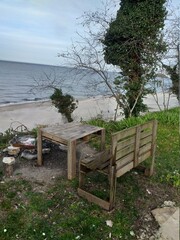 wooden bench on the beach