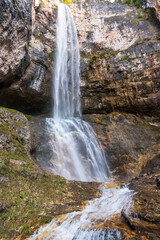 Fototapeta na wymiar Tret waterfall. Italy. Dolomite. Alps.