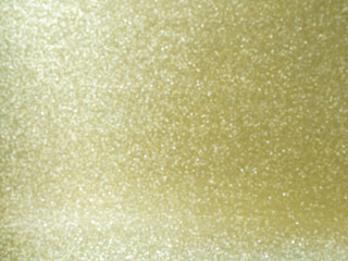 Golden glitter background with bokeh for festive holidays 
