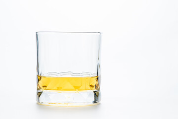 whiskey or brandy in rock glass or Old Fashioned glass  isolated