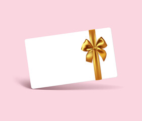 Blank white gift card with realistic gold ribbon bow