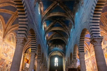 The beautiful frescos inside the San Gimignano Dome, Tuscany
