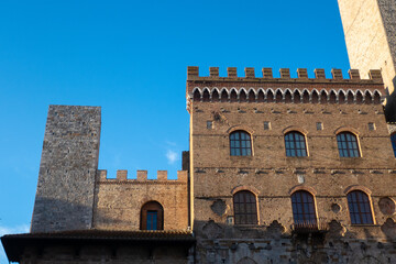 Streets and buildings of little ancient town of San Gimignano, Tuscany, along via Francigena