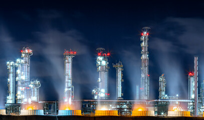 smoke from refinery, petrochemical and petroleum industry produce fuel and power energy for...