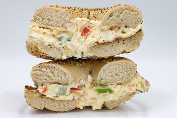 New York City Style Everything Bagel Filled with Vegetable Cream Cheese and Cut in Half