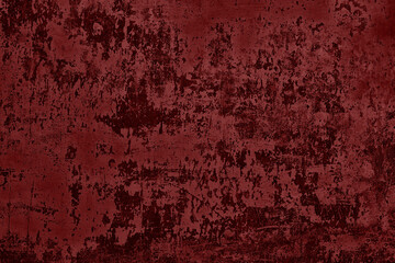 Old peeling paint surface texture. Shabby red wall. Abstract gloomy grunge retro background