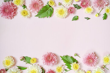 Flowers frame with copy space on pink.Greeting  floral card with chrysanthemums,  can be used as wedding invitation card.