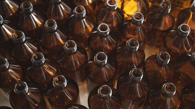 Small medicine bottles medicine container.  A close-up view of small amber bottles with white caps