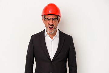 Middle age architect caucasian man isolated on white background  screaming very angry and aggressive.