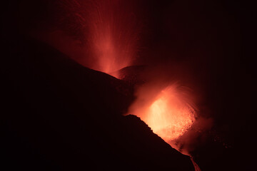 2021 Cumbre Vieja volcanic eruption (seen at night) on the island of La Palma, one of the Canary...