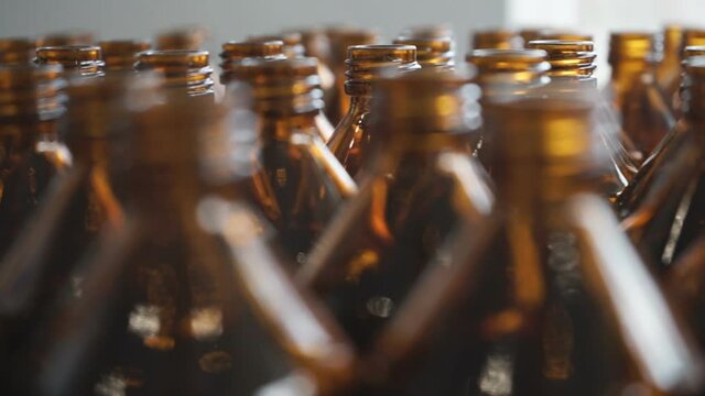 Small medicine bottles medicine container.  A close-up view of small amber bottles with white caps
