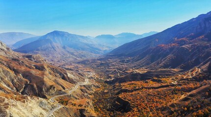 canyon with a road going into the distance 