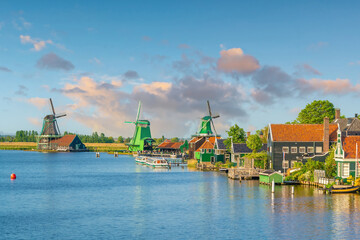 Fototapeta na wymiar Windmills in Zaanse Schans, Netherlands traditional village in Holland